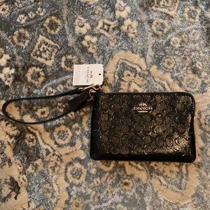 COACH wristlet. TAGS ON